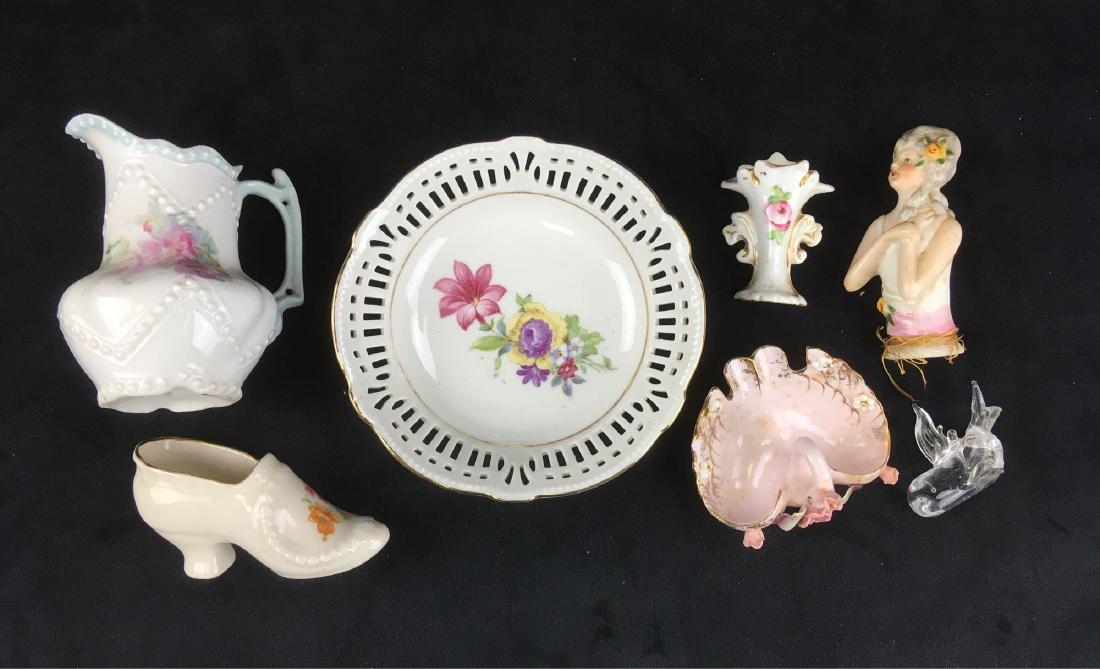 Mixed Lot of Porcelain Decorative Objects: Mixed Lot of Porcelain Decorative Objects; all materialsÂ needed to decorate like grandma. There are six porcelain objects and one small hand blown glass bird. The white trinket dish and doll torso