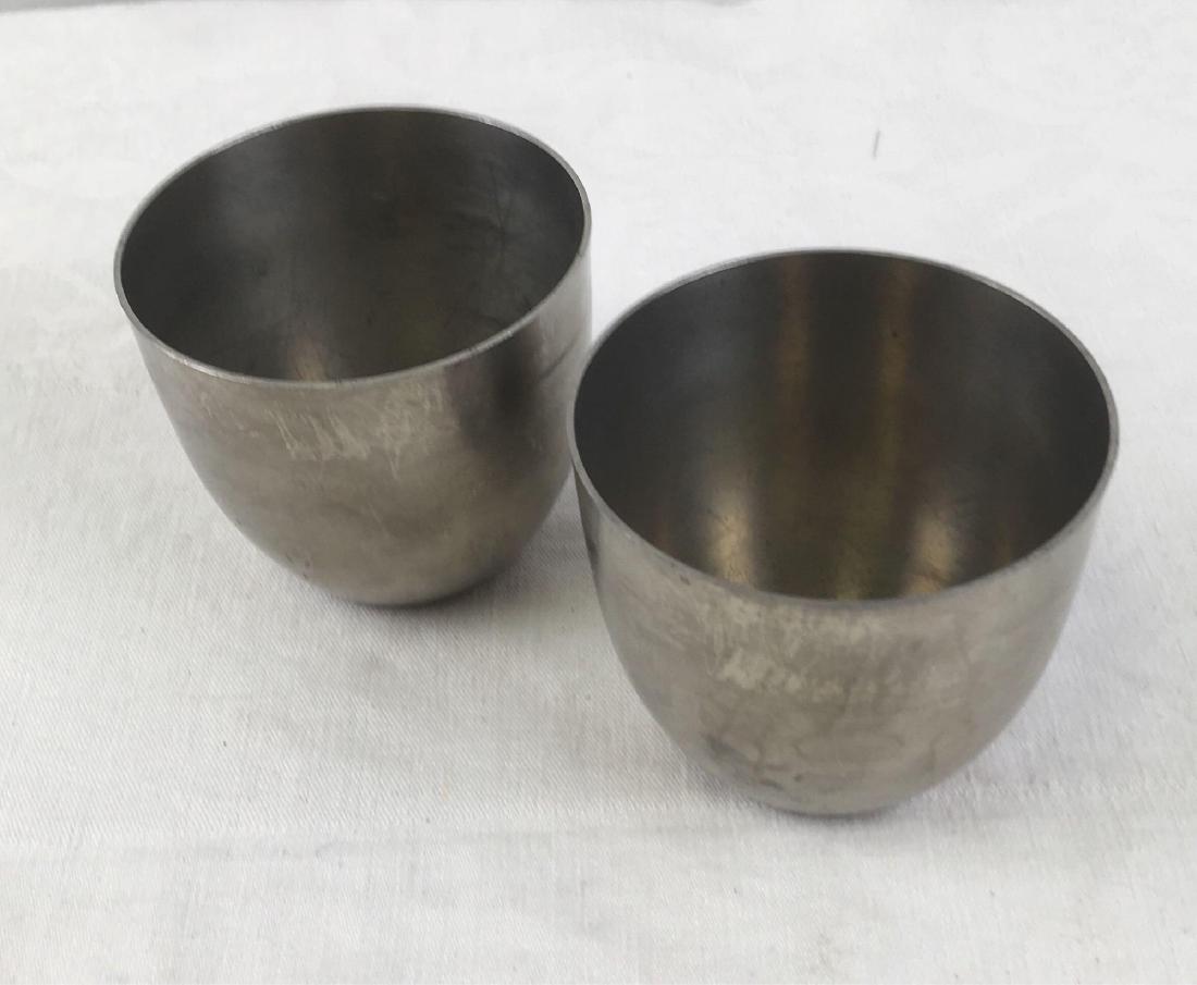 Pair of Pewter Jefferson Cups by Empire Pewter: Pair of Pewter Jefferson Cups by Empire Pewter; the original Jefferson cup was designed and commissioned by Thomas Jefferson in 1810. These are reproductions in pewter and and marked. They are in good