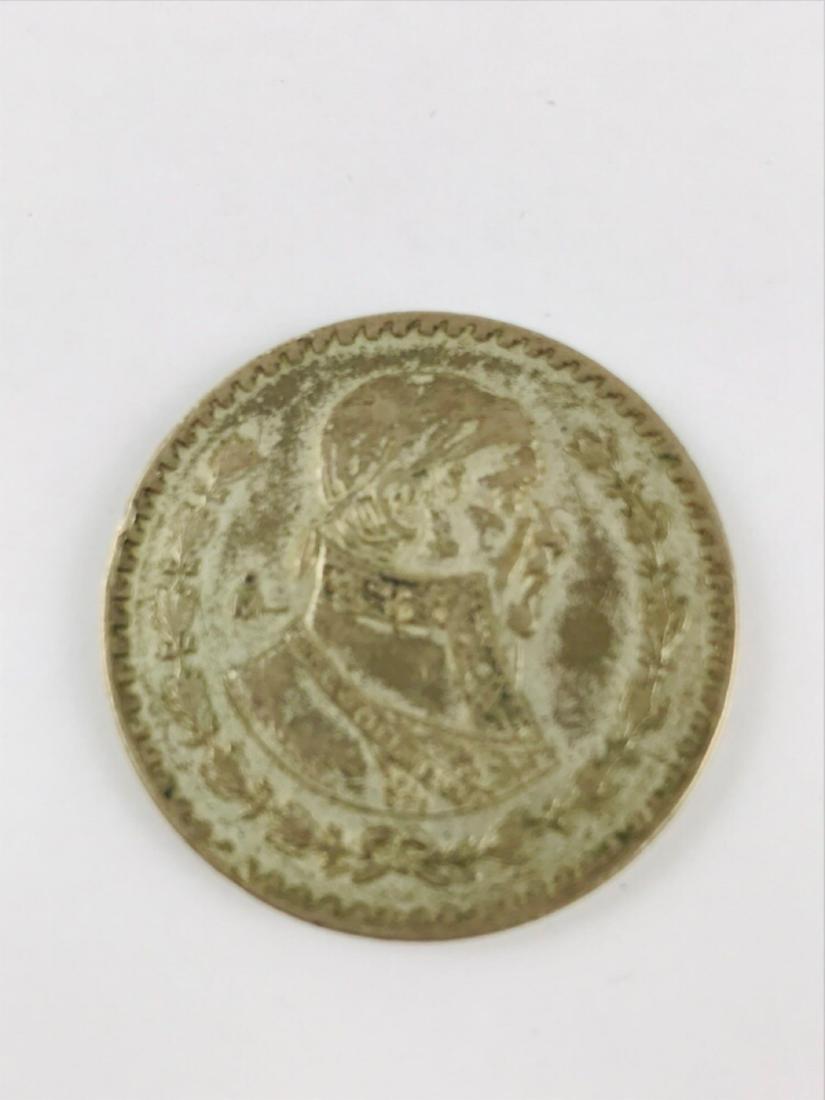 Vintage 1958 Mexico Silver Coin Peso: This vintage Mexican Silver coin features Jose Morelos, a Priest and rebel leader. He led the Mexican war of independence, was captured by Spain and executed for treason in 1815. His portrait appears 