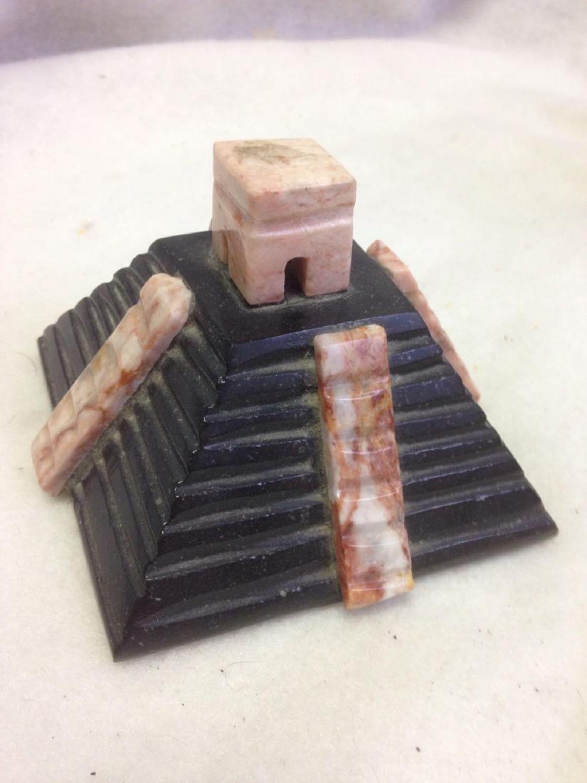 vintage carved Soapstone Mayan Temple: Here is a fun little Soapstone sculpture from Mexico. Â It is a little Mayan Temple carved in interesting purple hues. Â It stands only 3.5" x 4" but it is mighty. Â Condition: Very Good. Â Ot