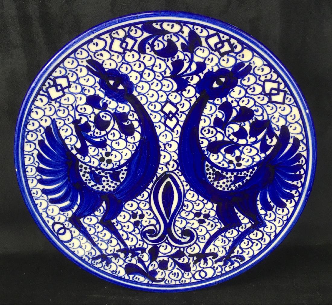 Vintage Hand Painted Decorative Plate Blue on White: Vintage Hand Painted Decorative Plate Blue on White Crowing Roosters; This plate is is marked "made in Spain". It is in good condition, it does show some minor chipping on the outside surface of the r
