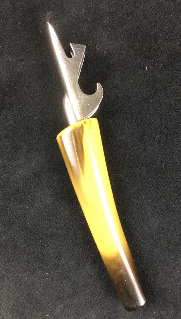 Vintage Trav L Bar Bottle Opened with Butterscotch: Vintage Trav-L-Bar Bottle Opened with Butterscotch Bakelite Handle; this vintage piece is in excellent condition and it will surely impress your Mid Century Modern guests. It is well marked. The piece