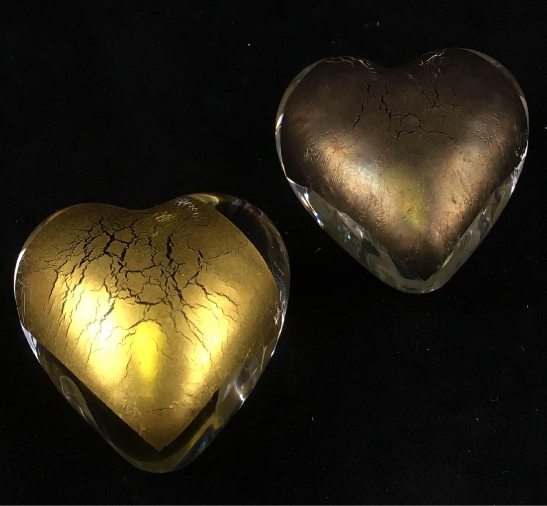 Pair Of Robert Held Heart Shaped Art Glass: Pair Of Robert Held Heart Shaped Art Glass; One features gold foil and the other has silver foil. Both are in excellent condition with no chipping or scratching and still have the original stickers. B