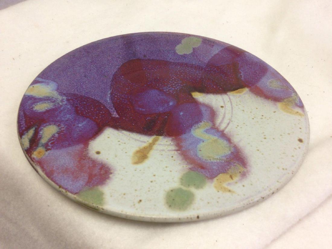 handmade PURPLE SKY Stoneware Platter: Here is a wonderful big Purple Sky Inspired Stoneware Platter thatÂ would make Prince proud. Â Made in the Southwestern USA. Â Size: 11" diameter. Â Condition: Excellent. Â Colors: Purples, 
