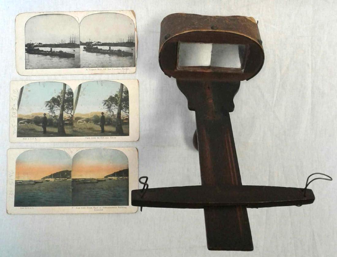 Vintage Stereoscope Viewer and Three Stereoscope Cards: Vintage Stereoscope Viewer and Three Stereoscope Cards; an old piece that has provided viewers a look of the world beyond the farm. The scope includes three cards; 1) A Torpedo Boat of San FranciscoÂ