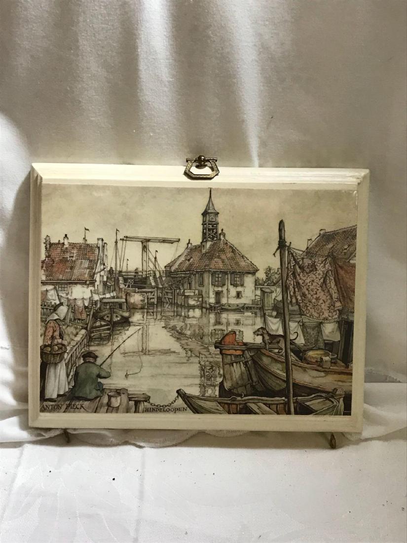 Anton Pieck Decoupage Hindeloopen Plaque: Anton Pieck Decoupage Hindeloopen Plaque; No scratching or chips. It measures at approximatelyÂ 7" L x 9" W.