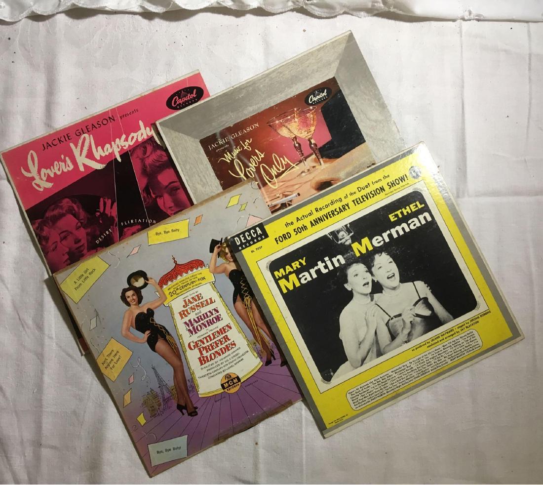 Lot of 4 Vintage 10" Vinyl Records, Circa 1950's: Lot of 4 Vintage 10" Vinyl Records; lot contains 2 Jackie Gleason Presents, the soundtrack of the movie Gentleman Prefer Blondes with Jane Russel and Marilyn Monroe, and a recording of Mary Martin and