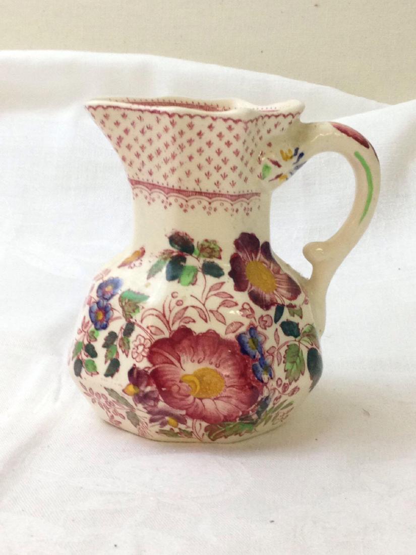 Mason's Ironstone Fruit Basket Pitcher England: Here is aÂ Mason's Water Pitcher Ironstone Fruit Basket Pitcher Made England. It measures 4.5" and isÂ inÂ very good condition. If you are a Wedgwood or Mason's collector this would be a great a