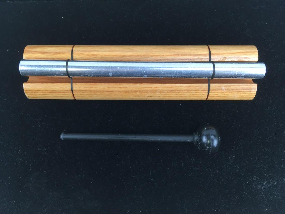 Woodstock Zenergy Chime Solo: Woodstock Zenergy Chime Solo; A tap of the mallet & this chime emits a powerful tone of singular beauty.Â Great for meditation and is in excellent condition. The chime measures at approximately 7" L