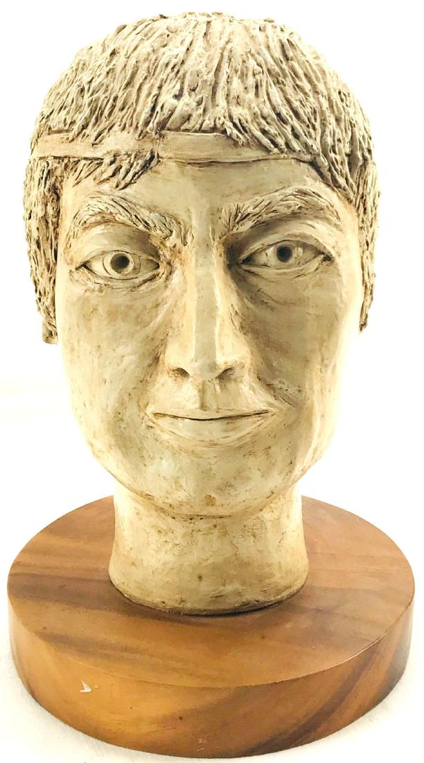 Vintage 1974 Bust Royal Acacia Monkey Pod Wood: Original carved resin bust mounted on royal acacia Monkey pod wood.Â It's signed Janus and LXXIV.Â the bust measures approximately 10" tall by 6" across.Â The base measures approximately 8" a