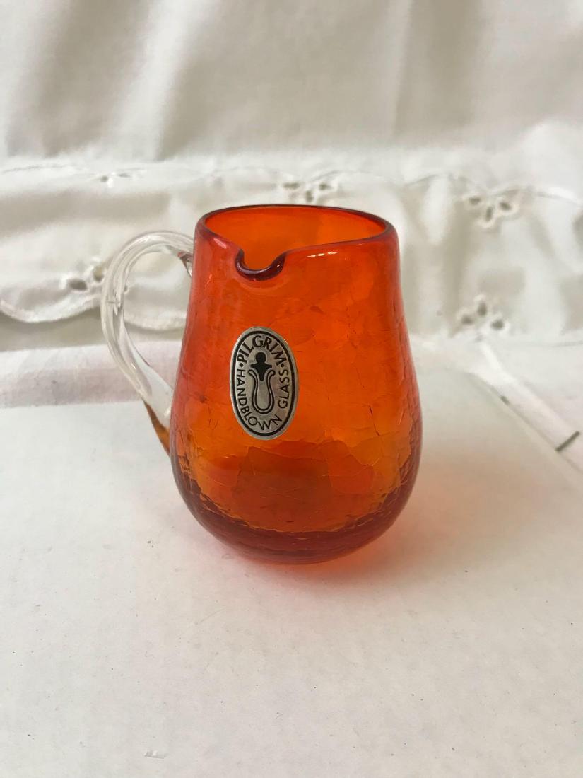 Vintage Pilgrim Crackle Glass Mini Pitcher: Vintage Pilgrim Crackle Glass Mini Pitcher; This adorable vintage pitcher is hand blown and in a lovely shade of orange. It measures at approximately 3 3/4 H x 2 3/4" W.