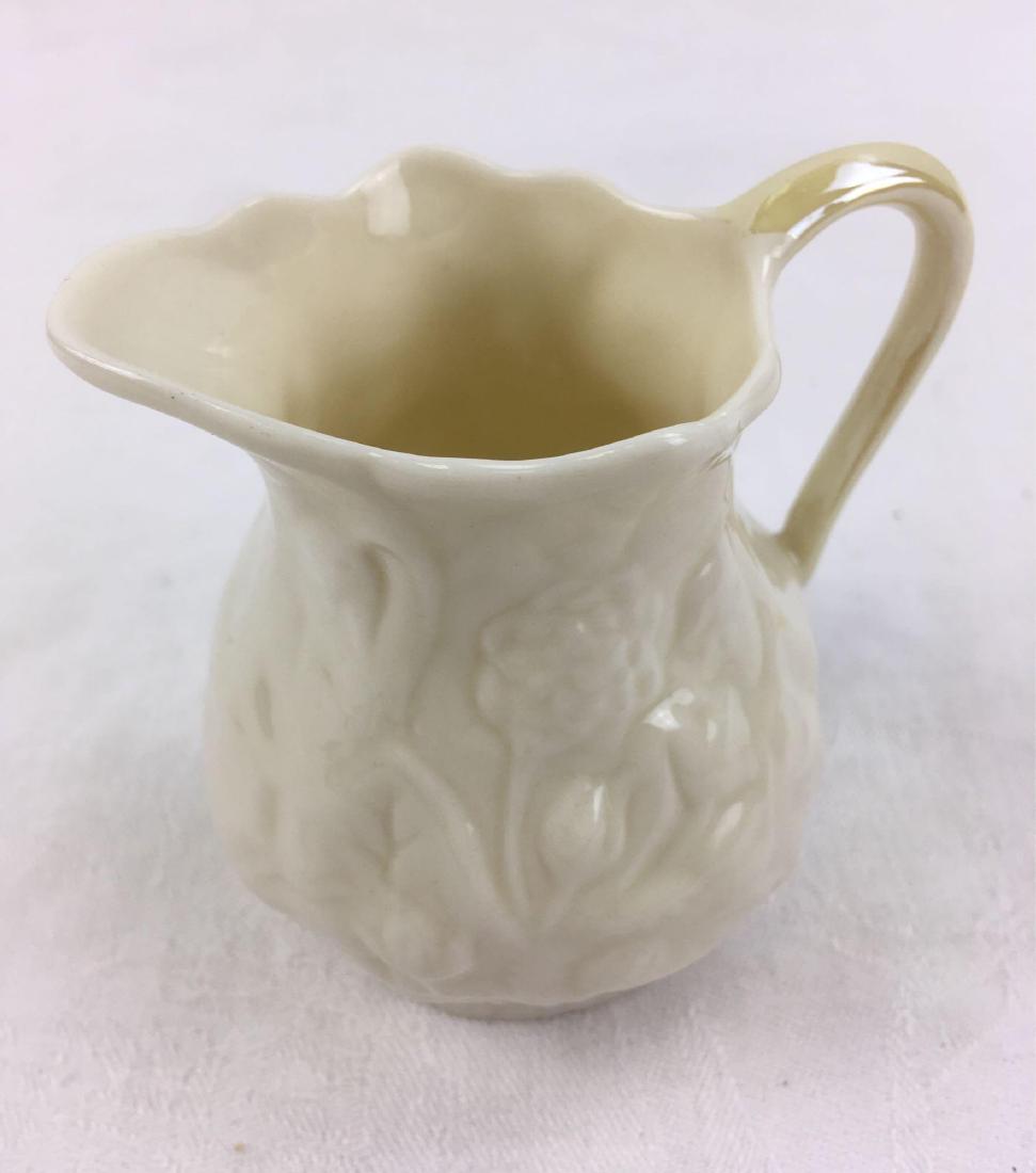 Vintage Beleek Creamer: Small china creamer by Irish potters, Beleek. In wonderful condition, with gold colored hallmark. Measures 3" H, 2" D