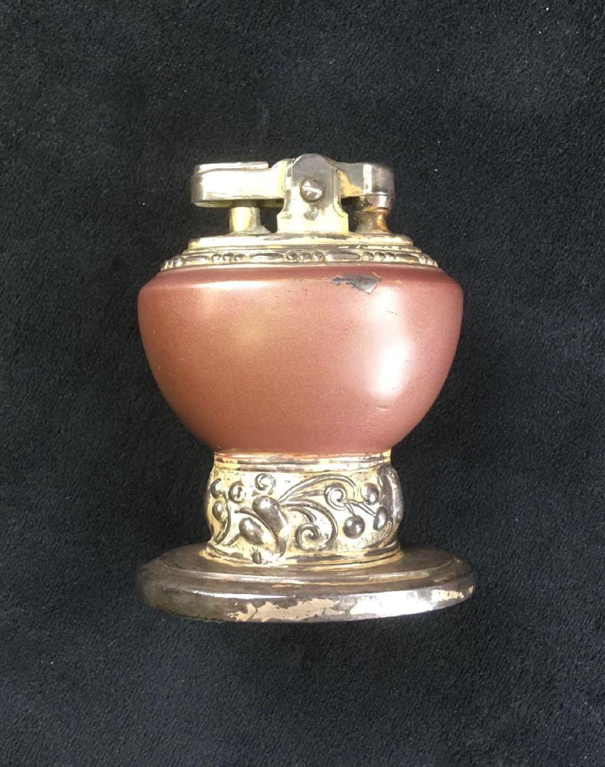 Vintage Ronson Leona Table Lighter: RonsonÂ silver plate table lighter, likely from the 1960's.3" tall, 1.1/2" x 2.1/2"