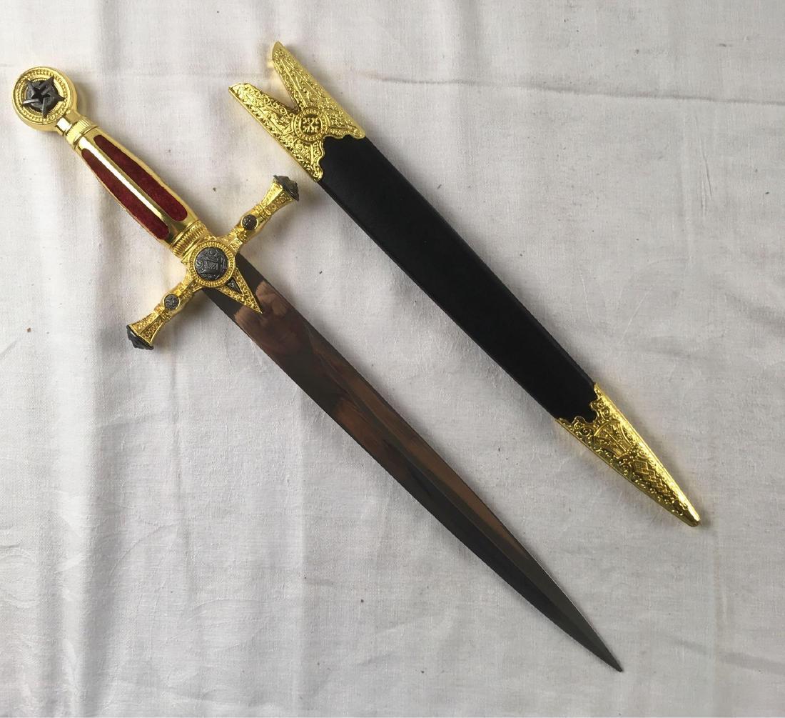 Masonic Templar Knight Freemasonry Sword with Sheath: Masonic Templar Knight Freemasonry Sword with Sheath; this is a short sword/long dagger. It shows many Masonic symbols including the square and compass at the center of the cross guard, a five sided s
