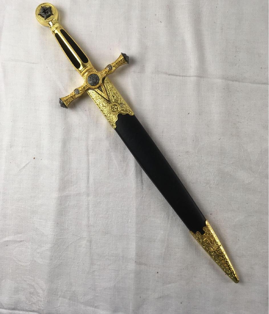 Masonic Templar Knight Freemasonry Sword with Sheath: Masonic Templar Knight Freemasonry Sword with Sheath; this is a short sword/long dagger. It shows many Masonic symbols including the square and compass at the center of the cross guard, a five sided s