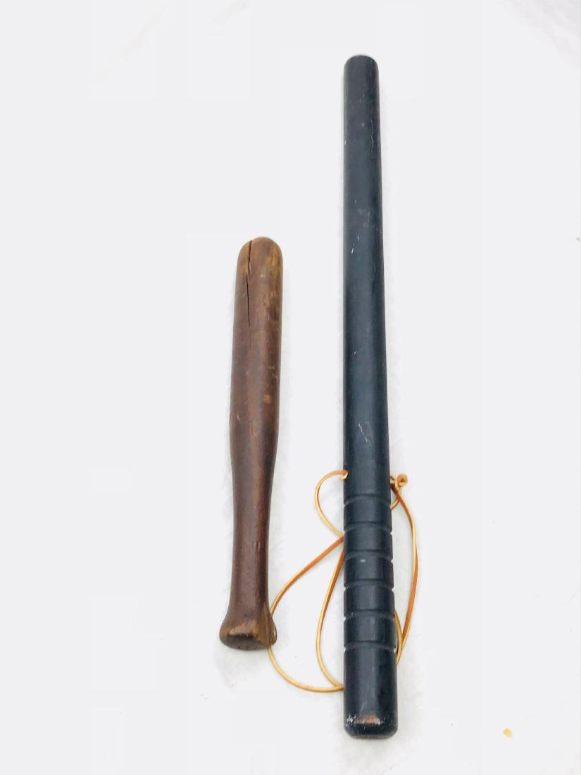 Vintage Wood Billy Club Nightstick: 2 vintage wood night sticks, billy clubs, tire knockers, etc.Â The black one measures approximately 24" long and is in good condition, the brown one is approximately 13" long and shows some splitti