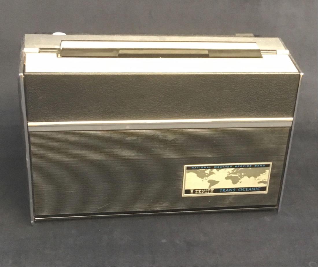 Zenith Trans Oceanic RD7000Y: Vintage Zenith Trans Oceanic RD7000YÂ Radio; Untested, but includes the cord, 9 D batteries, and an earphone. Features a compass and map for time zones. It measures at approximately 6 1/2" L x 13" W