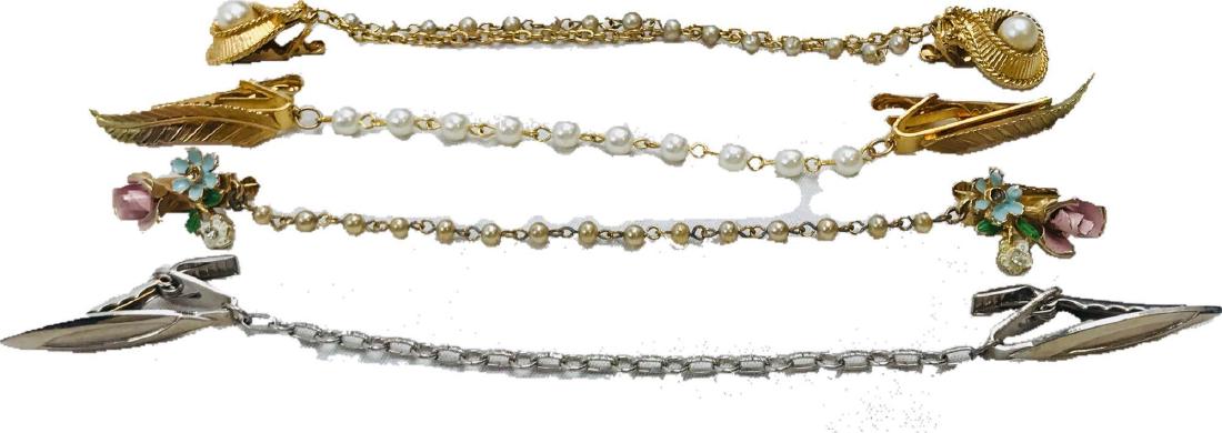 Vintage Collection Of Sweater Clips: Vintage Collection Of Sweater Clips; This fabulous collection of sweater clips believed to be circa 1950's are making a comeback! Three are gold toned with a classic lovely pearl simulated chain, and 