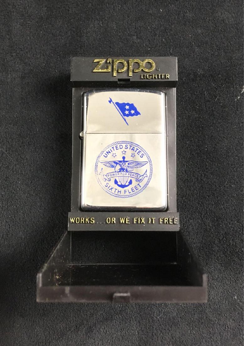 Military Memorabilia, Zippo Lighter Marked United State: Military Memorabilia, Zippo Lighter Marked United State Navy Sixth Fleet; on the reverse, this lighter is marked "Presented by Commander Sixth Fleet". The lighter is in very good condition with the on