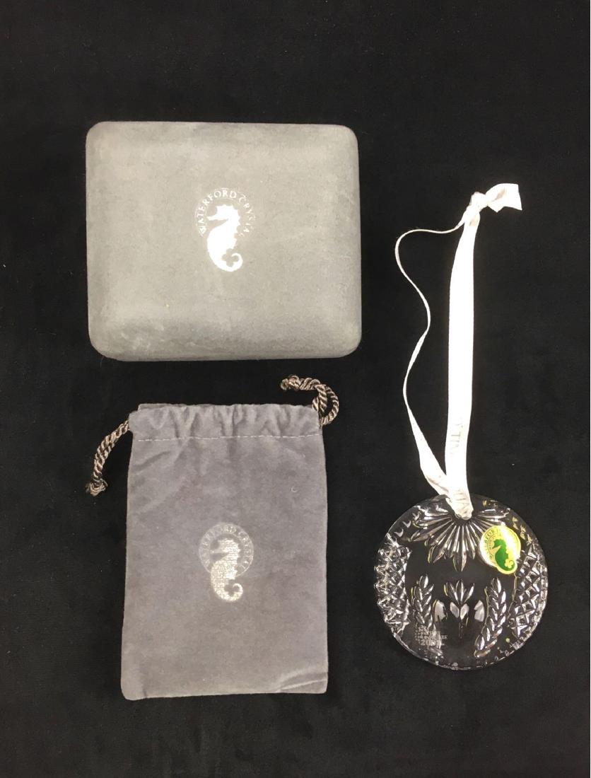 Waterford Crystal Times Square 2001 Ornament: Waterford Crystal Times Square 2001 Ornament; Made in Ireland and includes the original info pamphlet comesÂ in it's original gray box and velvet bag. The ornament measures at approximately 3" D.Â�