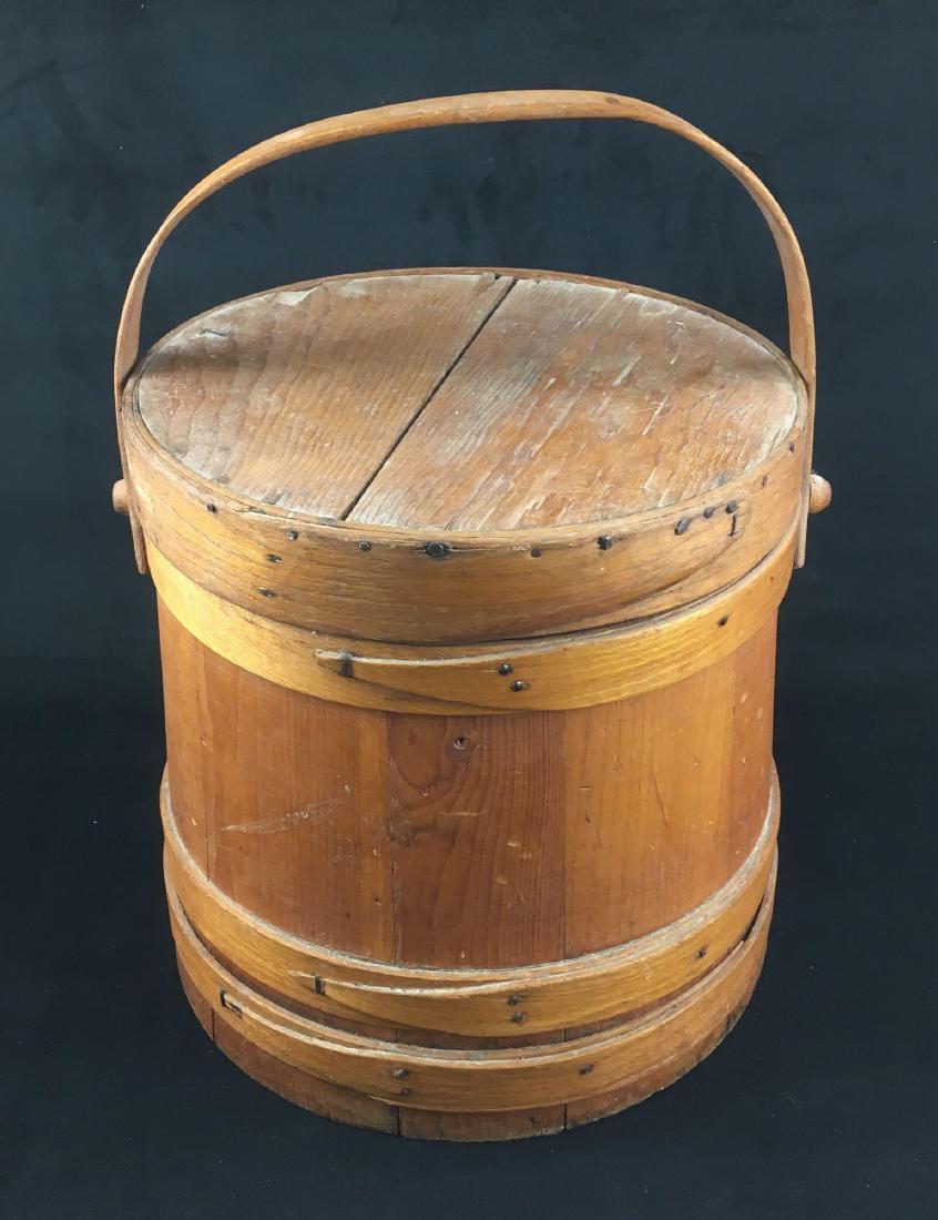 Vintage Cedar Wood Bucket Firkin with Hoop Handle and: Vintage Cedar Wood Bucket, Firkin with Hoop Handle and Lid; a white cedar bucket with bent oak bands. This wood bucket is in very good condition, the lid does show some minor chippingÂ of the wood a