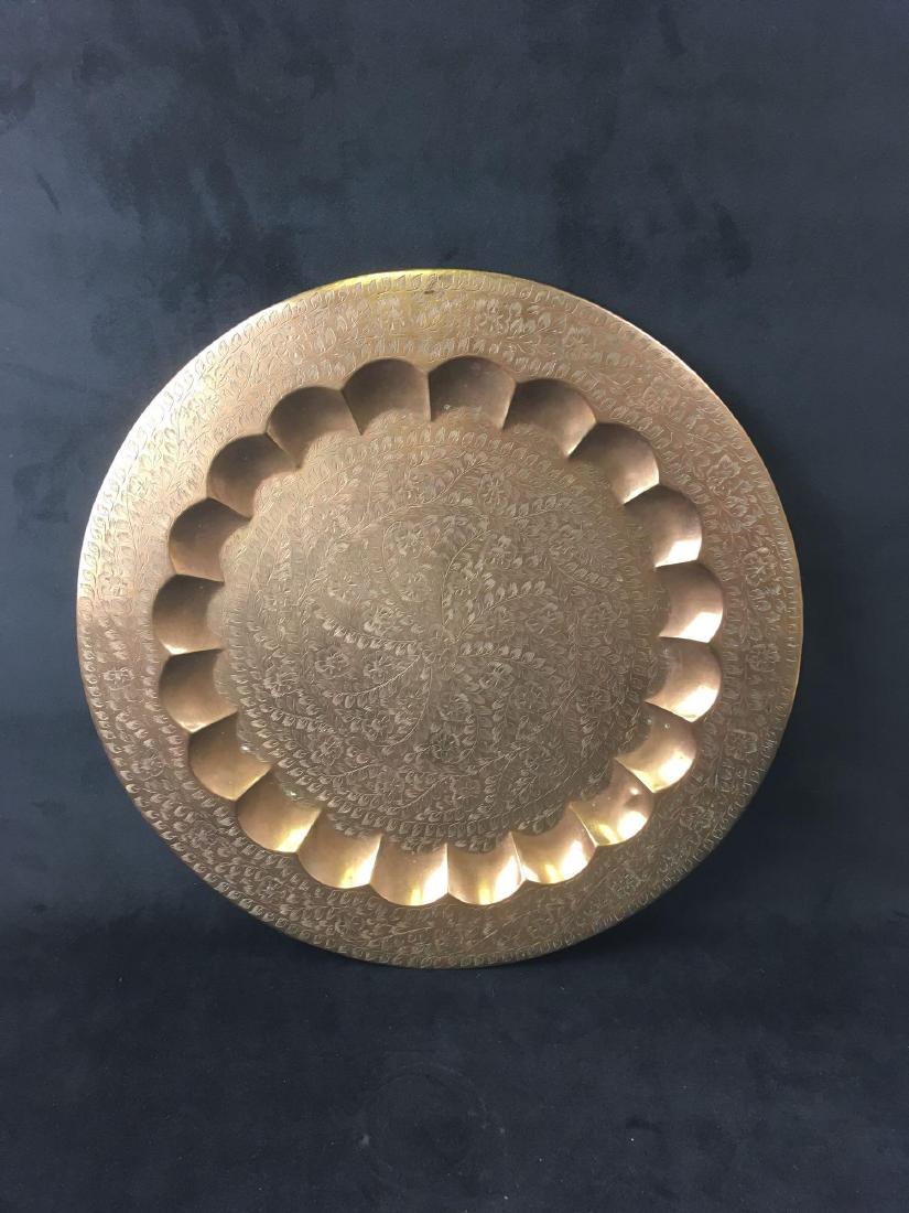 Decorative Brass Platter Tray India: Large brass try by World Gift, made in India. Likely from the 1970's or 80's. Measures 17.1/4" diameter, 1" rise.Â