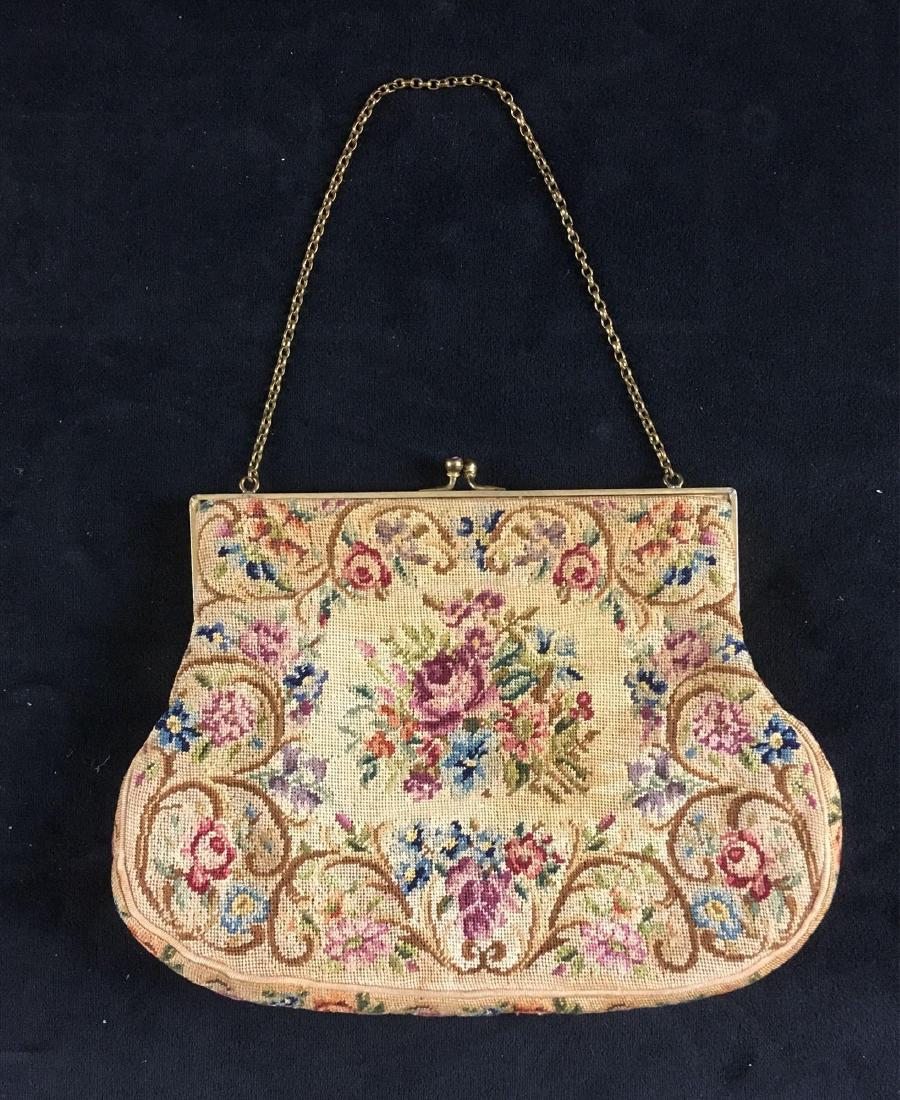 Vintage Needlepoint Handbag: Vintage Needlepoint Handbag; Super cute hand embroidered hand bag or coin purse. Features a chain strap and a is embellished with a classic rose floral pattern. Includes a square mirror inside. The pu