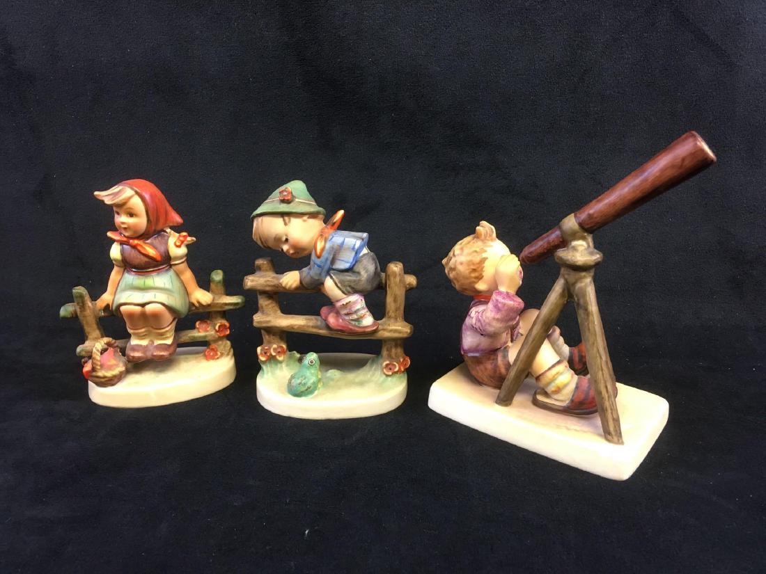 Lot of 3 Vintage Goebel Hummel Figurines, Marked: Lot of 3 Vintage Goebel Hummel Figurines, Marked; a nice collection of those Hummel kids acting up. Lot includes; 1) The Star Gazer, 2) Just Resting, and 3) Retreat to Safety.Â All are marked "W Ger