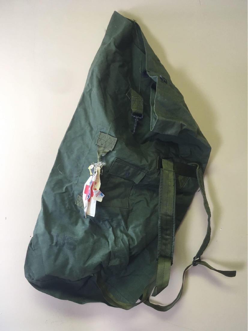 Korea Vietnam War Era US Marines Duffel Bag: Rarity to find in this condition, this olive drab duffel belonged to a Vietnam and Korean War veteran and has Quantico transfer dates of 1973. It is in amazing used condition, with no significant dama