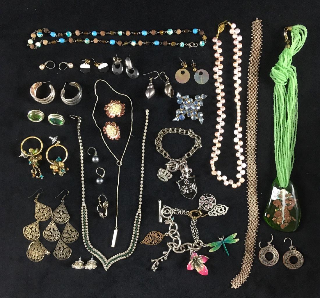 Vintage Bulk Costume Jewelry Lot: 38 pieces of old costume jewelry in various styles. Earrings, necklaces, charm bracelets and a dragonfly pin. All pieces shown are included.