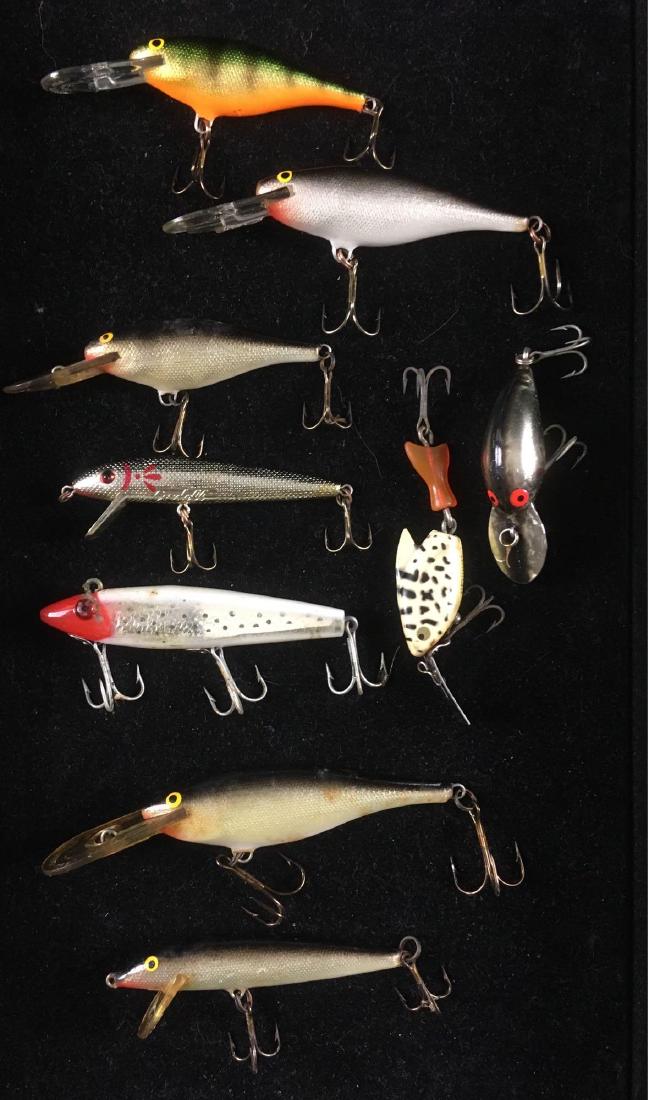 Vintage Fishing Lure Collection: Vintage Fishing Lure Collection; This collection includes a total of 9 lures in a variety of colors, each about the same in size measuring approximately between 3-3 1/2" L. Some include original box.