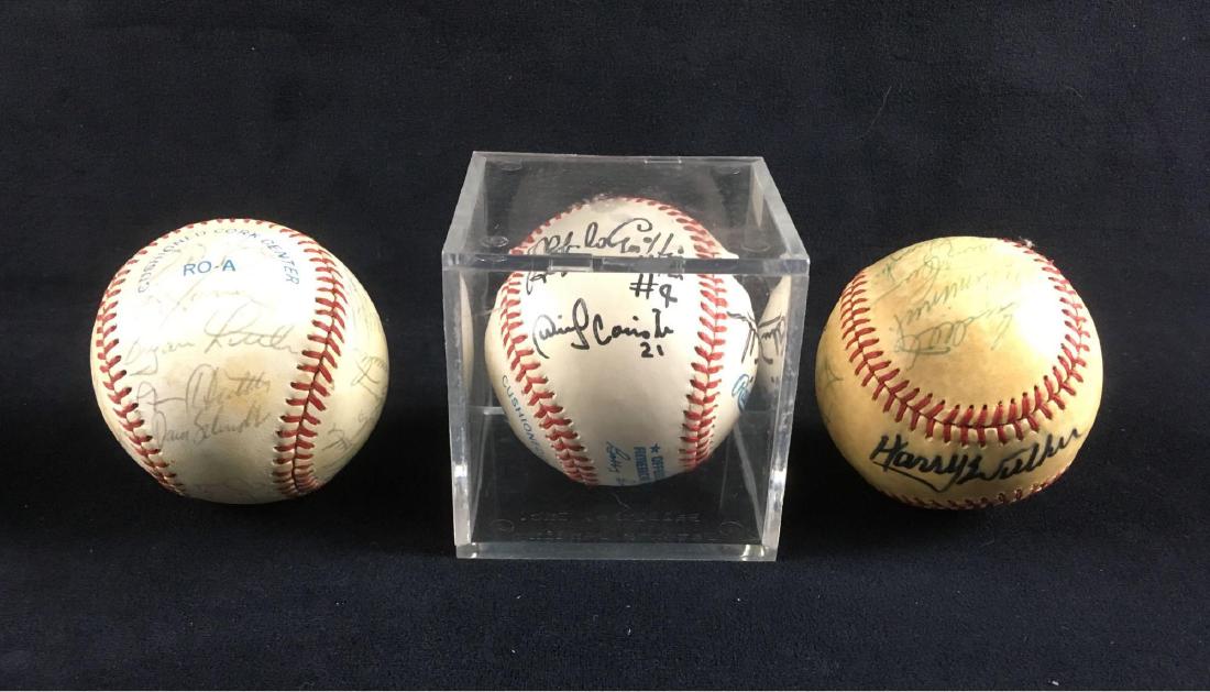 Sports Memorabilia 3 Autographed Baseballs Including: Sports Memorabilia, 3 Autographed Baseballs Including Hall of Famer Brooks Robinson; three baseballs each with multiple original autographs. 1) A banquet ball with signatures of Brooks Robinson (Hall 