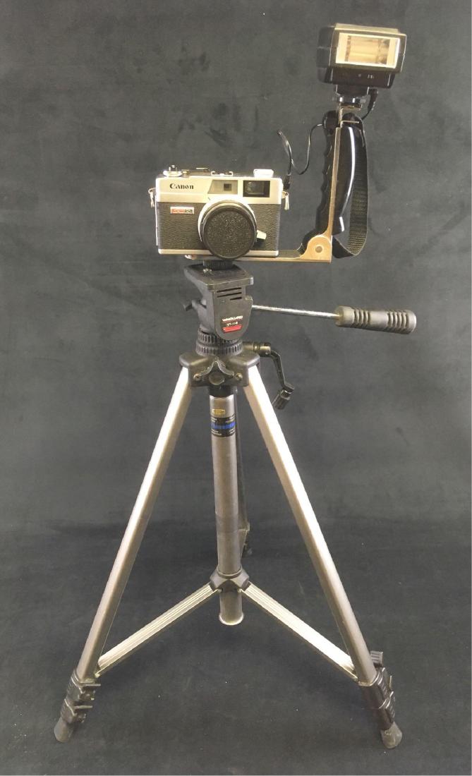 Vintage Canon CanonetÂ 35 MM Camera with Hot Shoe Flash: Vintage Canon CanonetÂ 35 MM Camera with Hot Shoe Flash Attachment; the camera and pistol grip flash are mounted on included vanguard tripod. All appears to be in very good condition. The camera and