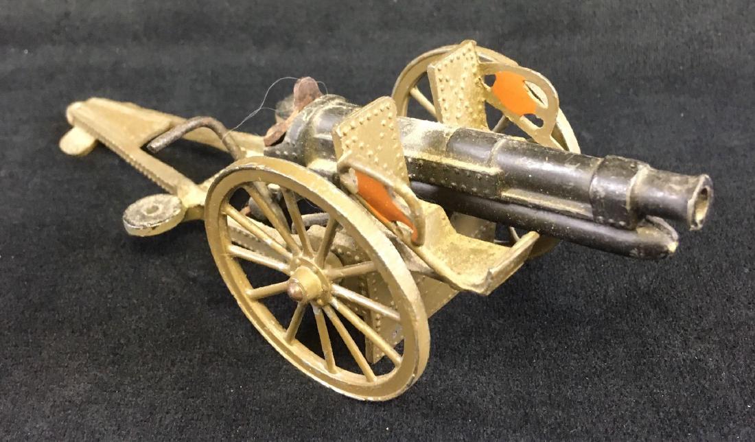 WWI Warren #34 Field Cannon Die Cast Tin Toy: Rare Warren Toy Company #34 field artillery cannon with functioning loading/firing mechanism. This is a really neat piece from a toy collectors hoard. It's in better than average condition, with minor