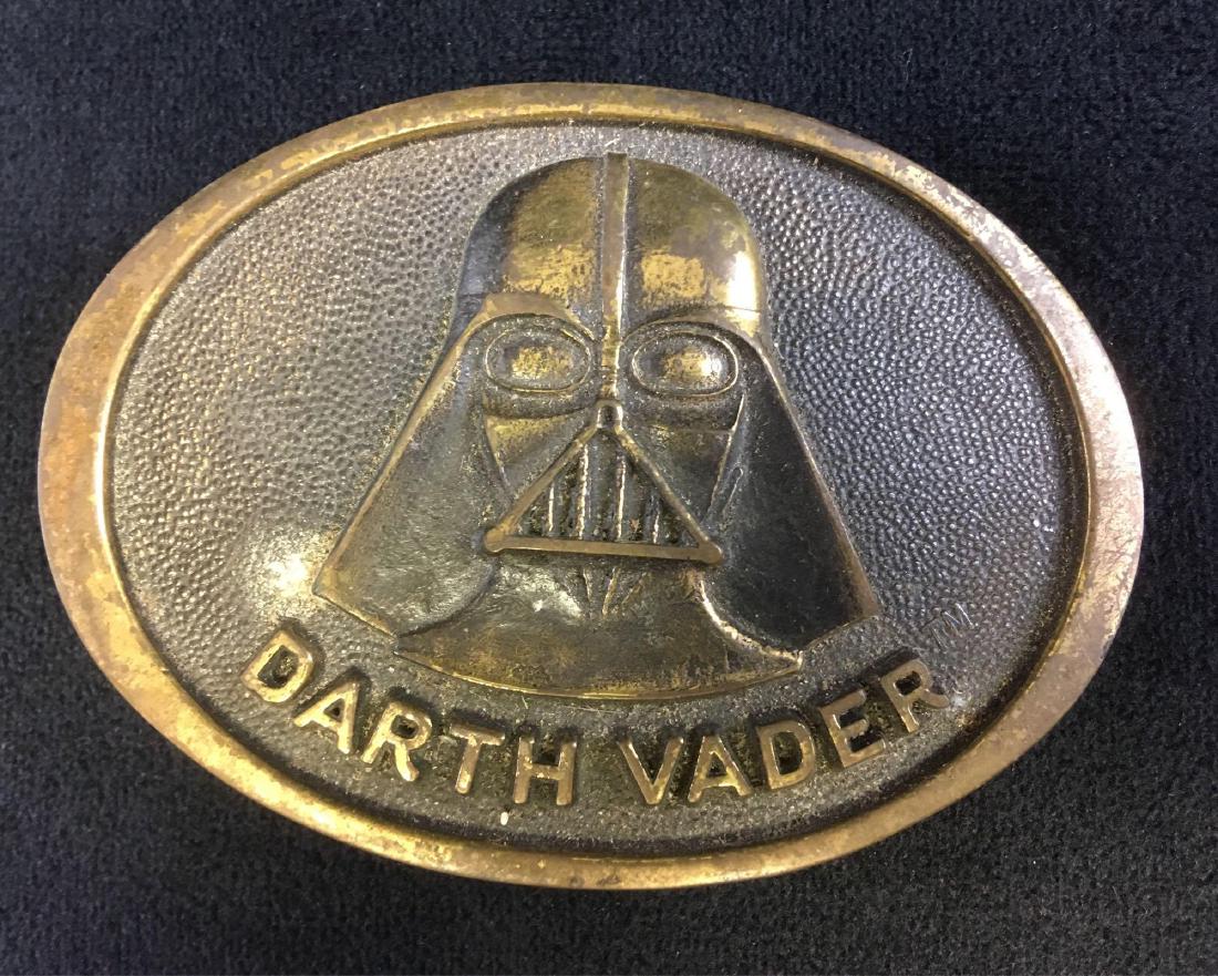 Original 1977 Star Wars Darth Vader Belt Buckle: All original belt buckle from 1977, an official, licensed Star Wars product featuring Darth Vader. Buckle was manufactured by Basic Tool and Supply, Berkeley, California and is made of solid brass. Th