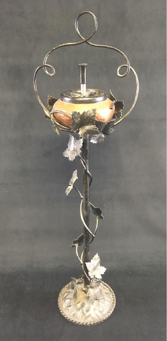 Vintage Freestanding Cigar Cigarette Ashtray: Vintage Freestanding Cigar, Cigarette Ashtray; a very distinctive Arts and Craft floor mounted ashtray showing an iron frame with vine and leaf motif and a hammered copper bowl, absolutely handsome. T
