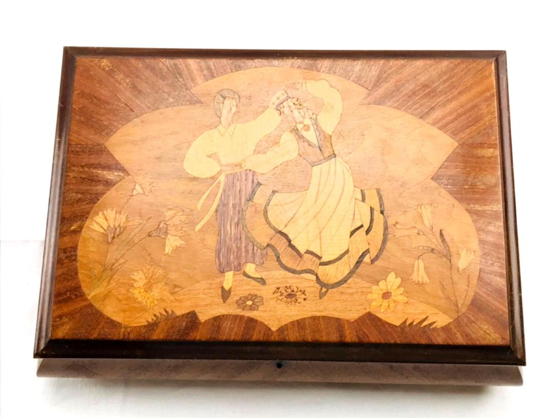 Vintage Eastern European Wood Inlay Jewelry Box: Vintage Eastern European Wood Inlay Jewelry Box; This is an incredible hand crafted piece thatÂ features a frivoling, dancing couple in traditional Eastern European clothes. The overall style of th