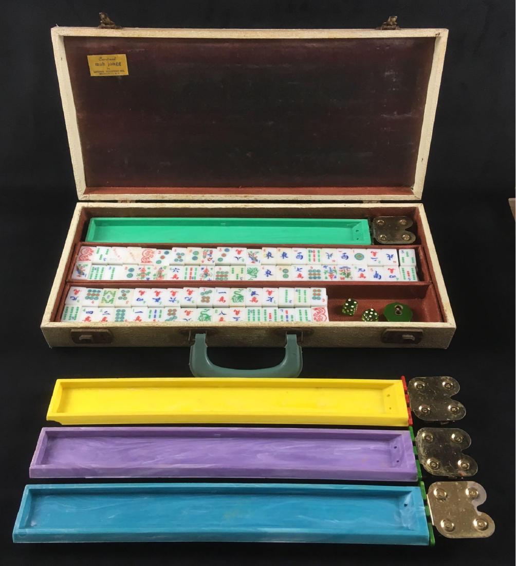 Vintage Mah Jongg Game Set in Original Case by Cardinal: Vintage Mah Jongg Game Set in Original Case by Cardinal Industries; this set includes 153 tiles, all are packed in the original carrying case that is marked Cardinal Industries, Brooklyn". All playing
