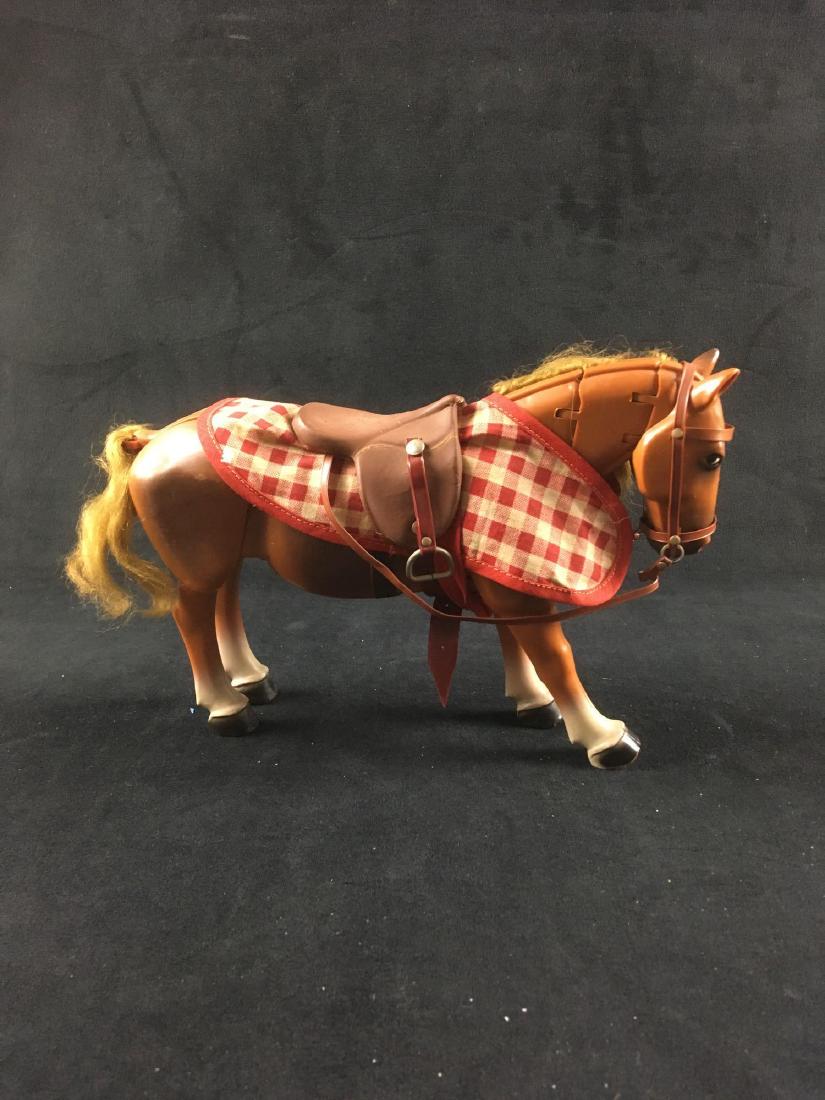 Plastic Toy Horse Fully Articulating from Germany: Plastic Toy Horse, Fully Articulating, from Germany; a very unique and complex constructed toy. It is marked with a stylist "A" and "Germany". All legs move, the neck is double jointed. The toy shows 