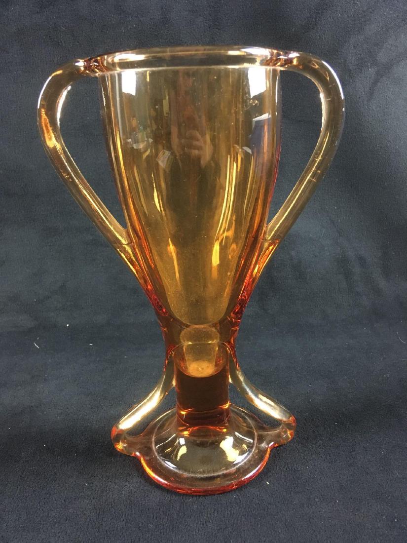 Vintage Fostoria Tut Amber Trophy Vase: Art glass style vase by Fostoria, Tut line, amber color. Vase is 8.1/2" tall and 3" in diameter. In excellent condition.