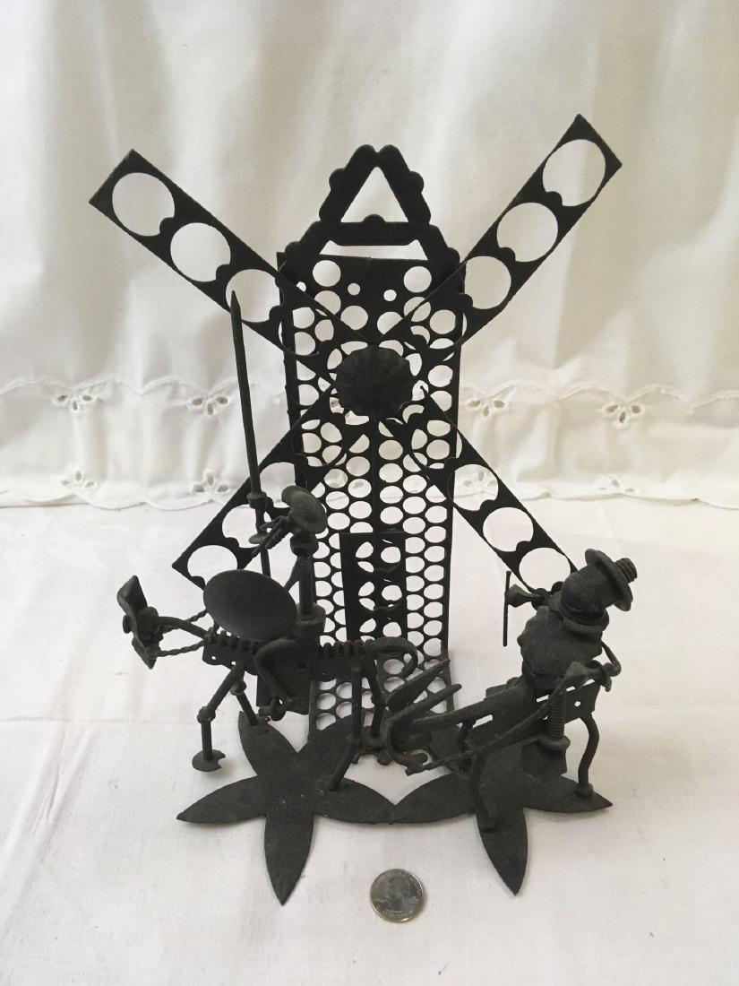 Vintage Iron Don Quixote Sculpture: Vintage Iron Don Quixote Sculpture; Depicts Man of La ManchaÂ slaying the windmill. It was made in Spain and measures at approximately 9" W x 11 1/2" H.