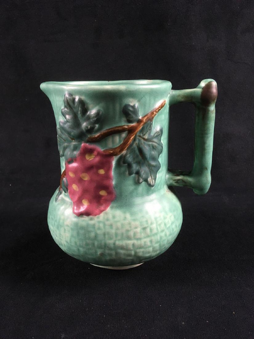 Vintage English Arts and Crafts Earthenware Pitcher: Vintage English Arts and Crafts Earthenware Pitcher, Marked Shorter & Son, Stoke on Trent; this pitcher is in excellent condition.It shows a floral and lief motif. The colors are strong, the matte fin