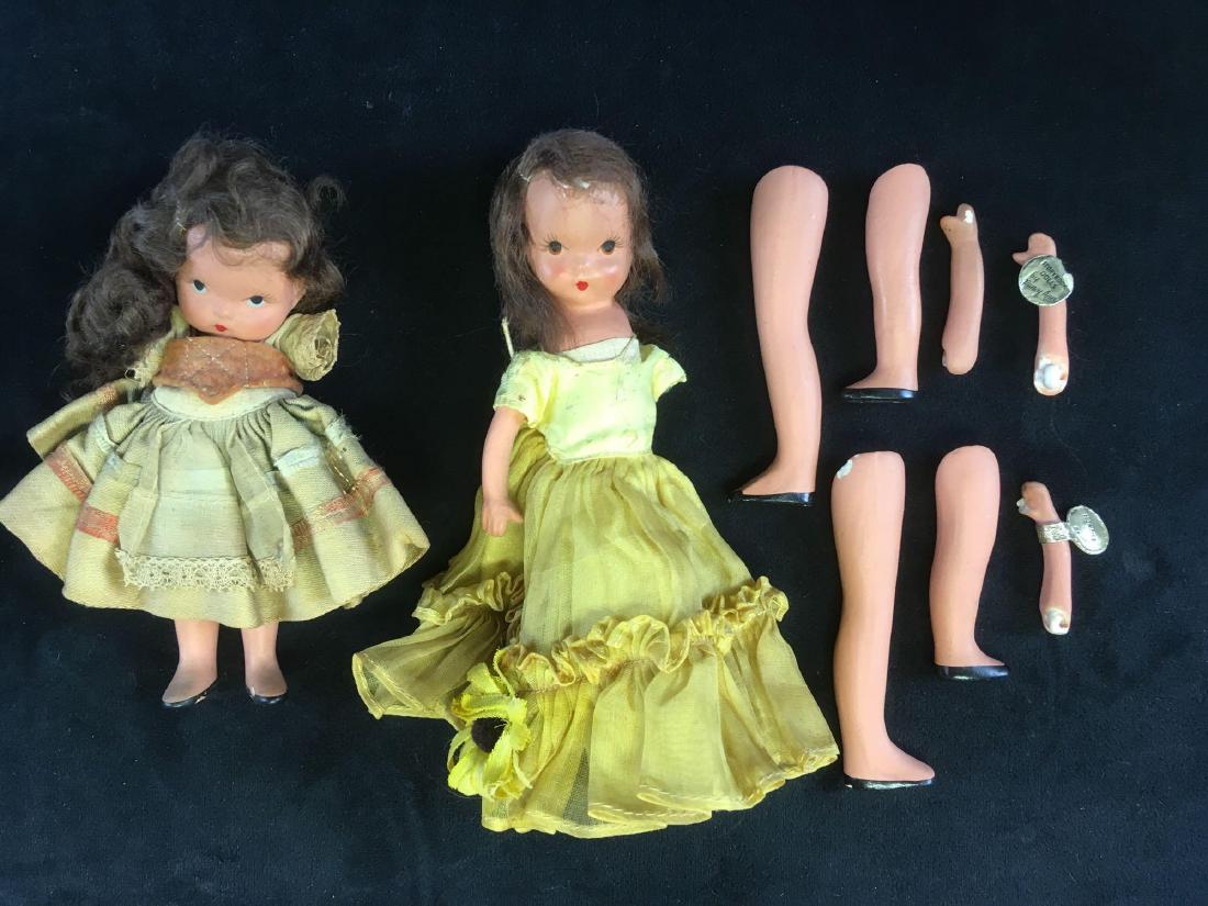 Antique Story Book American Made Dolls: Two Story Book dolls by Nancy Ann in restorable condition, originally offered by Miller Brothers in Chattanooga TN for the princely sum of $1.25 each. One doll is in good condition and still has her t