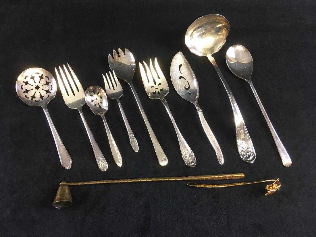 Formal and Fancy Serving Utensil Set: 11 piece lot of silver plated serving pieces and others. Manufacturers like Roger Bros, Melody, Community and others. Measurements from left to right; 7.3/4" L, 8" L, 6" L, 6.1/4" L,&nb