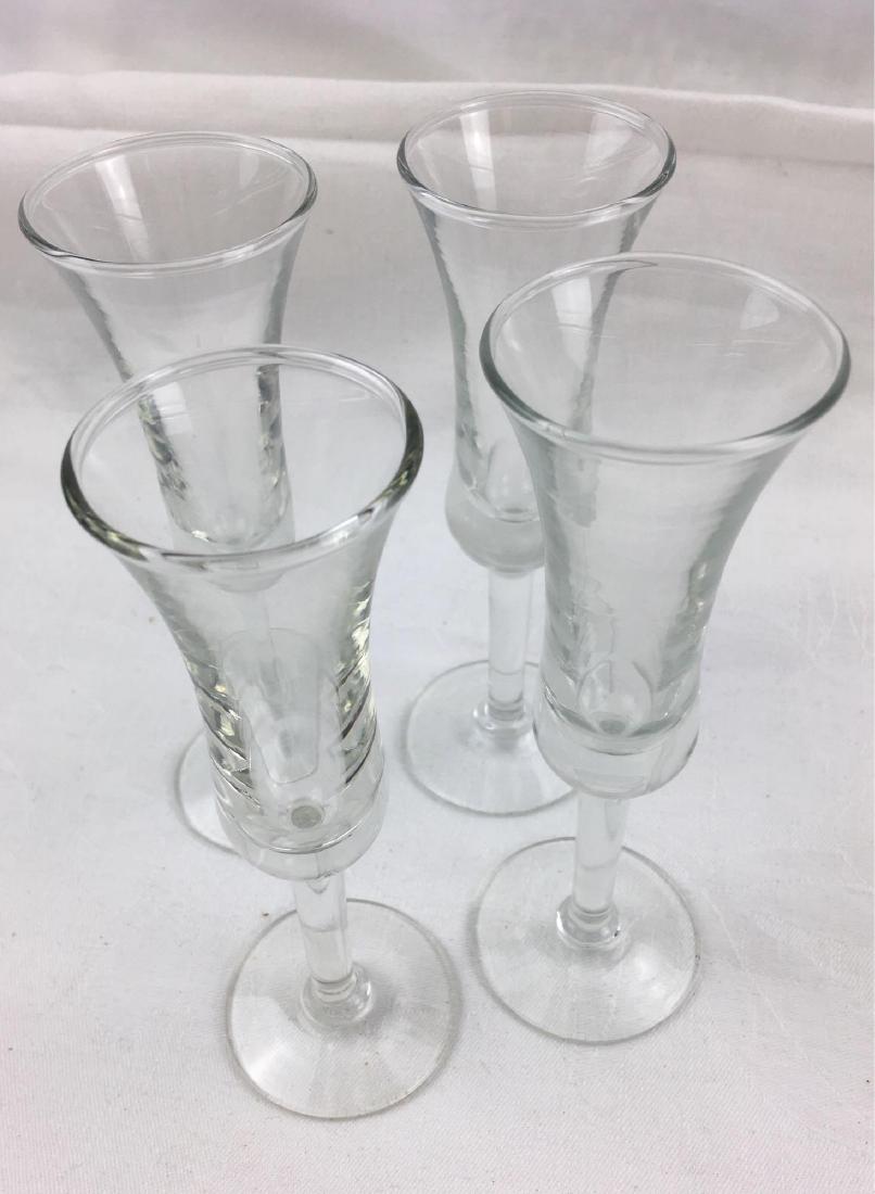 Set of 4 Stemmed Cordial/Sherry Glasses, by Libby: Set of 4 Stemmed Cordial/Sherry Glasses, by Libby; a very nice set of 4 stemmed glasses. Each shows a mark on the base that appears as a feather. These glasses are in excellent condition, each measure