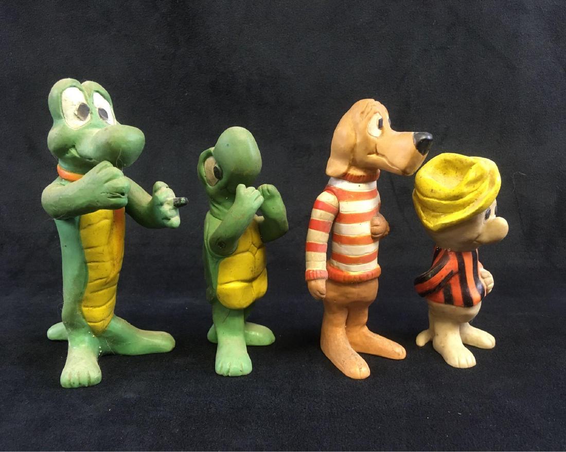 Vintage Pogo Figures Walt Kelly: Lot of Walt Kelly P&G Comics Pogo figurines made of soft rubber. Lot includes Albert Alligator, Pogo Possum, Beauregard Hound and Churchy La Femme Turtle. These figures need a good cleaning, but are i