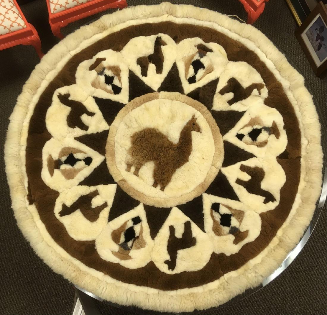 Vintage Alpaca Round Rug: Vintage Alpaca Round Rug; Made with real fur that comes in a variety of browns and whites and features an alpaca in the center and measures at about 70" D and 2" pile.Â