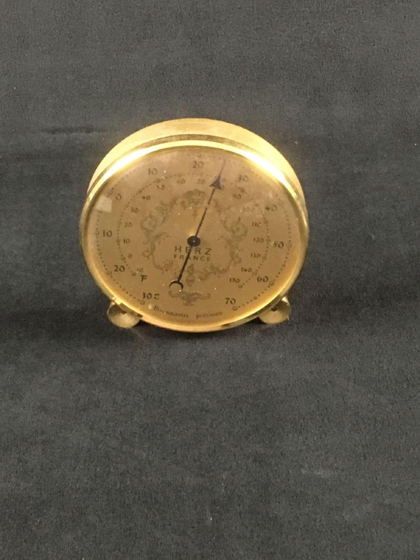 Vintage Brass Herz Celsius Fahrenheit Thermometer: Vintage Brass Herz Celsius Fahrenheit Thermometer. This thermometer is in good condition. The glass is slightly scratched. Thermometer displays both Fahrenheit and Celsius on it. Thermometer is 4" in 