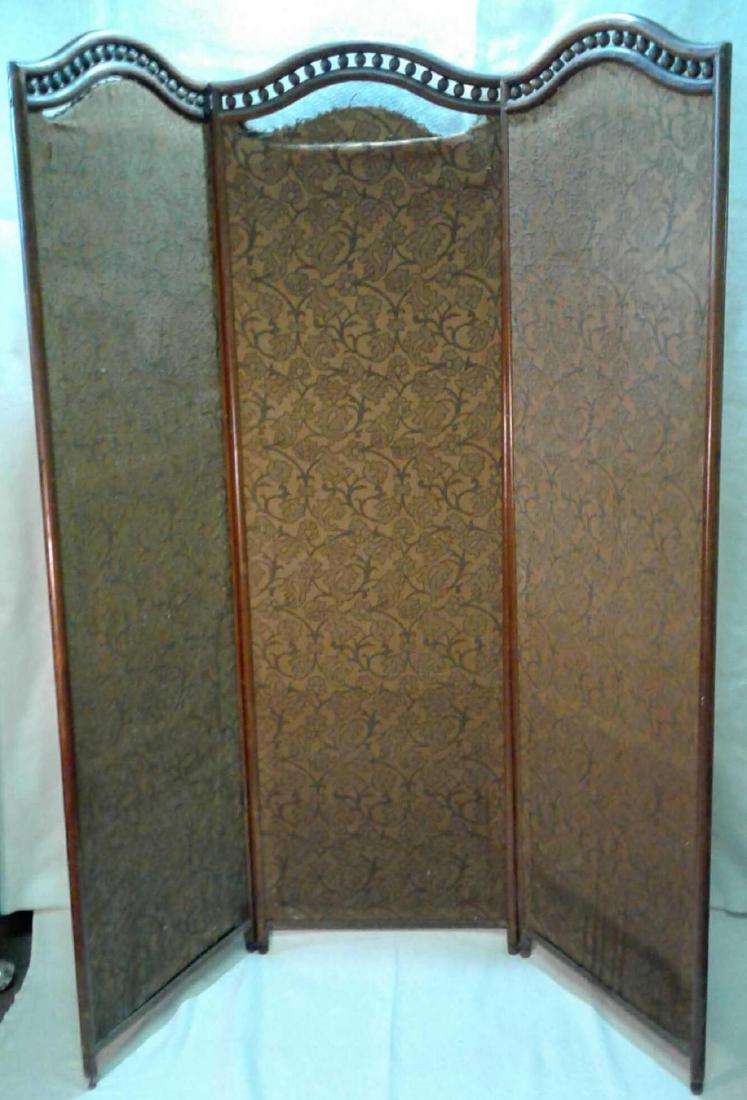 3 Panel Cloth And wood Room Divider: An antique room divider dressing screen with threeÂ panels that has handcrafted wooden pegged ovals and a finished wooden frame. Panels have fabric insets with a colorfulÂ green and gold floral de