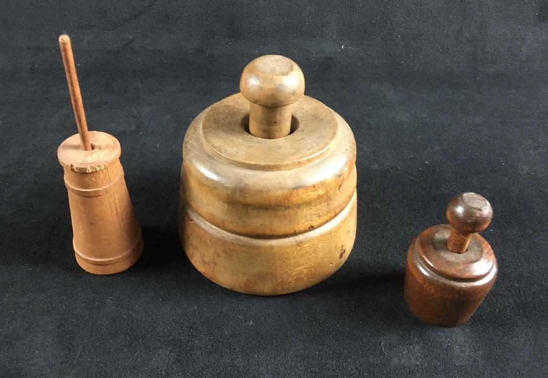 Primitive Americana 2 Vintage Butter Molds and a: Primitive Americana, 2 Vintage Butter Molds and a Small Butter Churn; the large mold appears to be antique, it shows a flower motif. The small mold does not show as much age and has a wheat motif. The